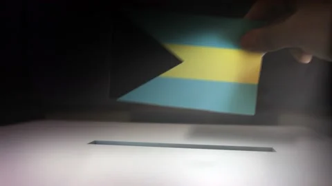 Compositing Hand Voting To Flag OF Bahamas   Vídeo Stock 148898603