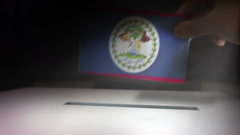 Compositing Hand Voting To Flag OF Belize  Stock-Footage 148900040
