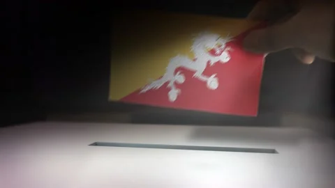 Compositing Hand Voting To Flag OF Bhutan  Stock-Footage 148900202