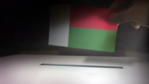 Compositing Hand Voting To Flag OF Madagascar  Stock-Footage 149154507