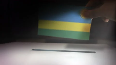 Compositing Hand Voting To Flag OF Rwanda  Stock-Footage 149340124
