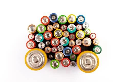 Composition with alkaline batteries on white background. Chemical waste. Top  Stock Photos