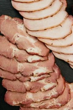 Composition of aromatic, smoked cold cuts. Close up. Breakfast before beer. 库存照片