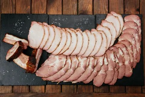 Composition of aromatic, smoked cold cuts. Breakfast before beer. 库存照片