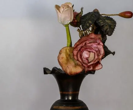 Composition of artificial flowers. Фото