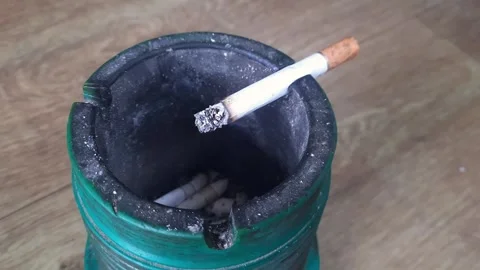 Composition with an ashtray and cigarettes Video stock 333104582