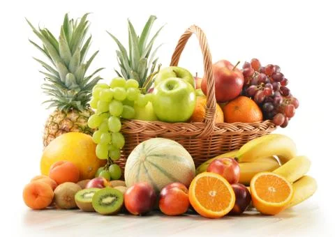 Composition with assorted fruits in wicker basket Stock Photos