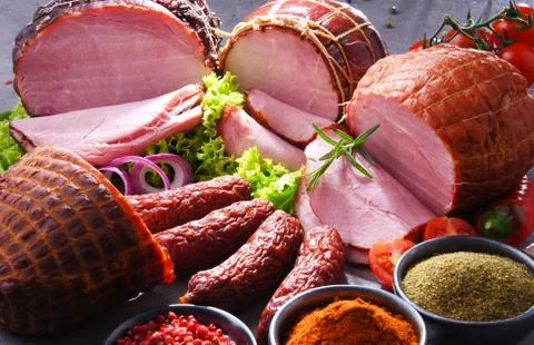 Composition with assorted meat products. Stock Photos