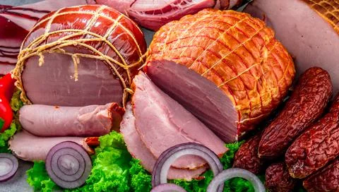 Composition with assorted meat products. Stock Photos