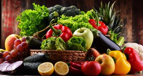 Composition with assorted organic vegetables and fruits. Stock Photos