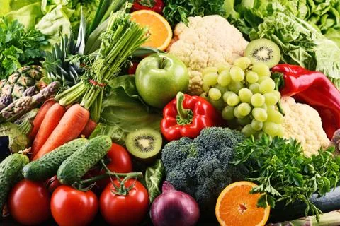 Composition with assorted raw organic vegetables and fruits. Detox diet Stock Photos