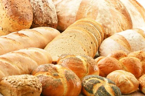 Composition with baking products including different sorts of bread and rolls Stock Photos