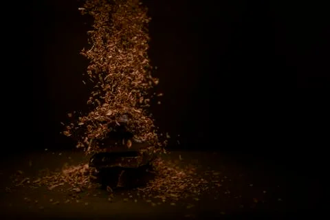 Composition of bars and pieces of different milk and dark chocolate, grated c Stock Photos