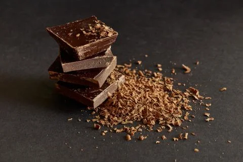 Composition of bars and pieces of different milk and dark chocolate Stock Photos