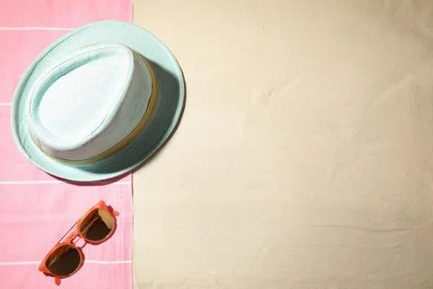 Composition with beach accessories and space for text on sand, flat lay Stock-Fotos