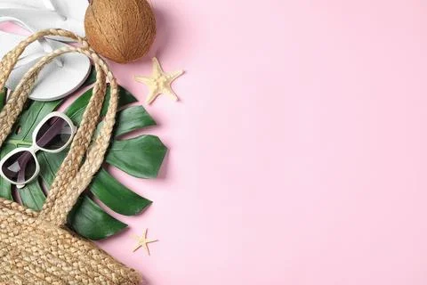 Composition with beach accessories and space for text on pink background, fla Stock Photos