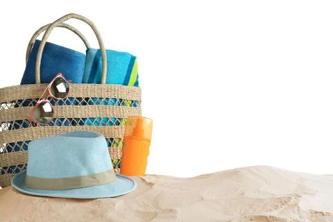 Composition with beach objects on sand against white background. Space for te Fotos de archivo