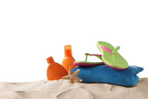 Composition with beach objects on sand against white background 스톡 사진