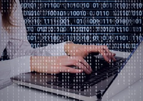 Composition of binary coding and data processing over woman using laptop Stock Photos