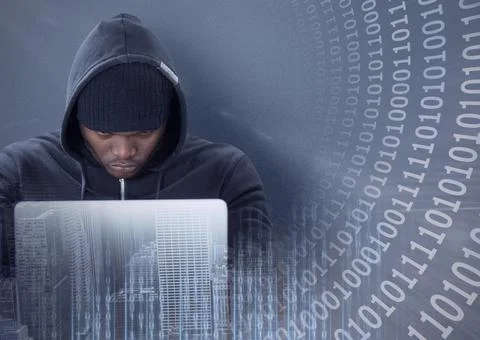Composition of binary coding over hacker in hood using laptop Foto stock