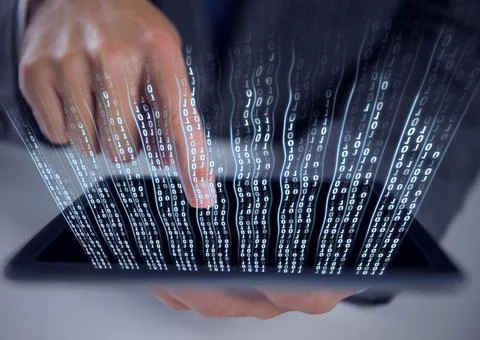 Composition of binary coding over man using tablet Stock Photos