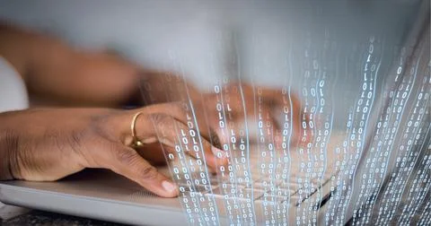 Composition of binary data processing over man typing on laptop keyboard Stock Photos