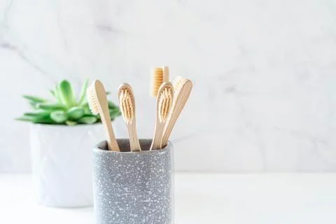 Composition with biodegradable bamboo toothbrushes. Stock Photos