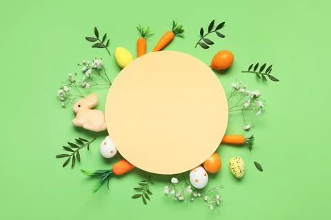 Composition with blank card, Easter eggs, gypsophila flowers and green twigs  Stock Photos