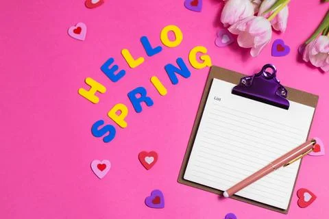 Composition with blank, words Hello Spring and beautiful tulip flowers on p.. Stock Photos