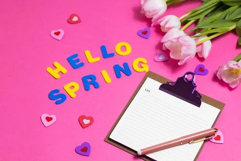 Composition with blank, words Hello Spring and beautiful tulip flowers on p.. Stock Photos