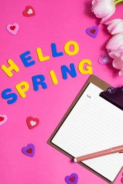 Composition with blank, words Hello Spring and beautiful tulip flowers on p.. Stock Photos