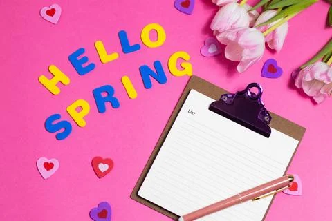 Composition with blank, words Hello Spring and beautiful tulip flowers on p.. Stock Photos