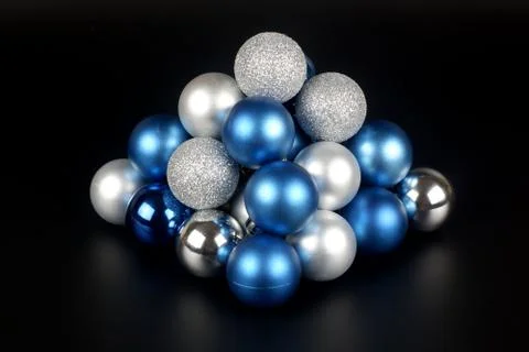 Composition from a blue and silver shiny and matte christmas balls close up v 스톡 사진