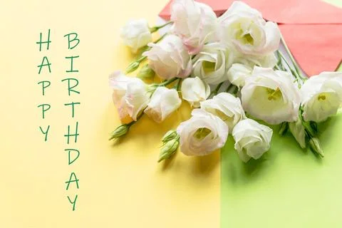 Composition with bouquet with eustoma, envelope. Floral decorative elements on Stock Photos