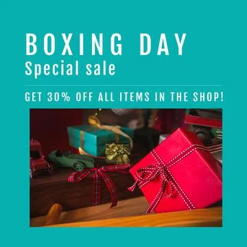 Composition of boxing day sales text over christmas presents and decorations Stock Photos