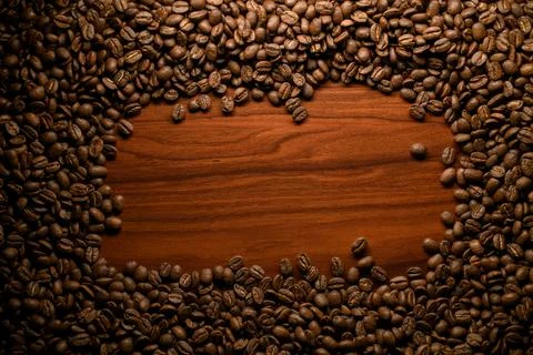 Composition of brown roasted coffee beans. Can be used as background. Stock-Fotos