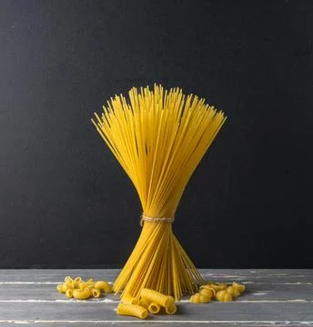 Composition of a bunch of spaghetti and with different types of pasta Stock Photos