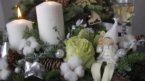 Composition of burning candles on a background of fir branches. romantic setting Видео 122287939