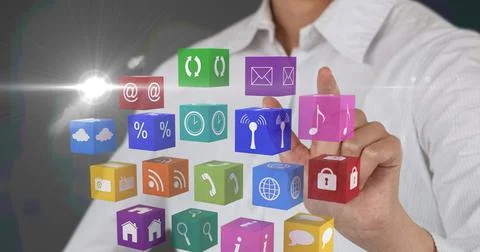 Composition of businessman touching screen with digital colourful icons Stock Photos