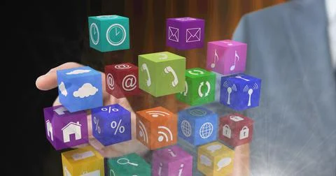 Composition of businessman touching screen with digital colourful icons 스톡 사진