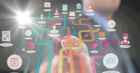 Composition of businessman touching screen with digital colourful icons Foto stock