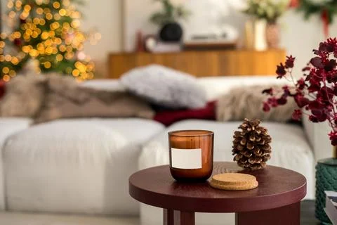 Composition with candle mock up in ornate holders on table. Christmas decoration Stock Photos