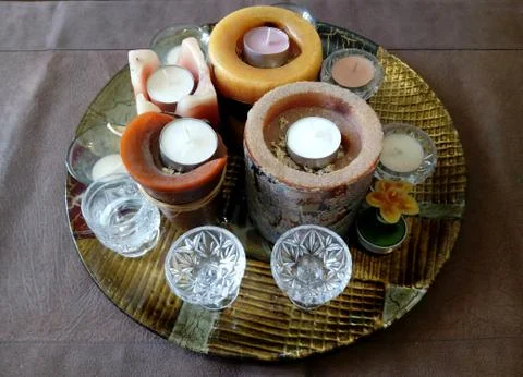 Composition of candles decorating a coffee table Stock Photos