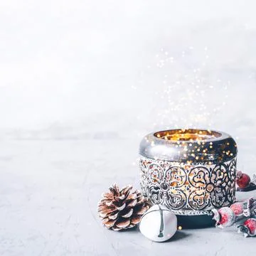A composition of candlestick, snow branches and Christmas decorations. Stock Photos