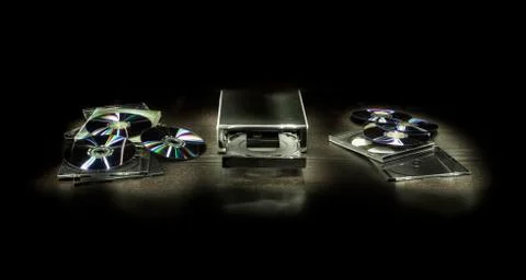 Composition with cds and cd player Stock Photos