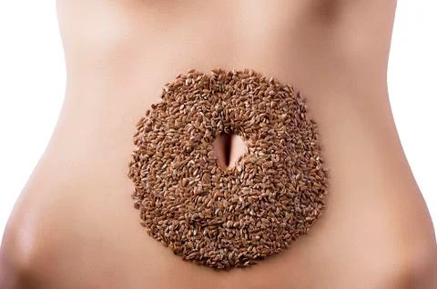 Composition of cereals over belly Stock Photos