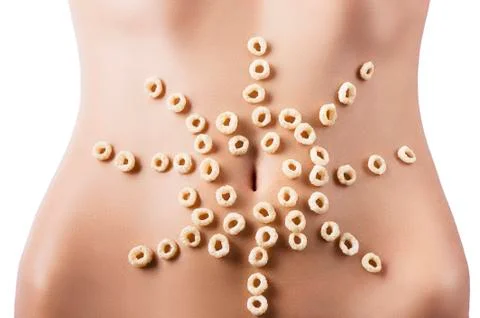 Composition of cereals over belly Foto stock