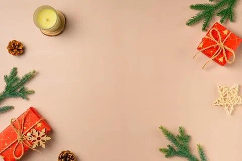 Composition with Christmas decor on beige background. Space for text Foto stock
