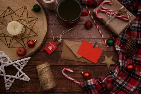 Composition with Christmas elements cup of coffee and caramel canes Stock Photos