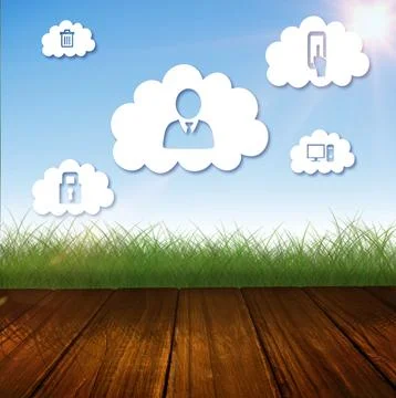 Composition of clouds with icons over grass and sky Foto stock